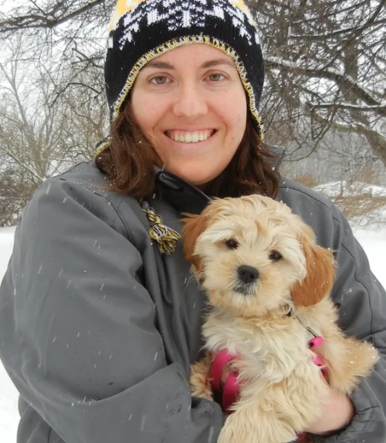 Elisabeth Smith holding her dog.