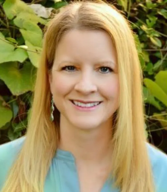 A headshot of Rebecca (Brown) Achariyakosol.