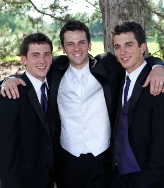 Tauber Brothers and Sisters hugging